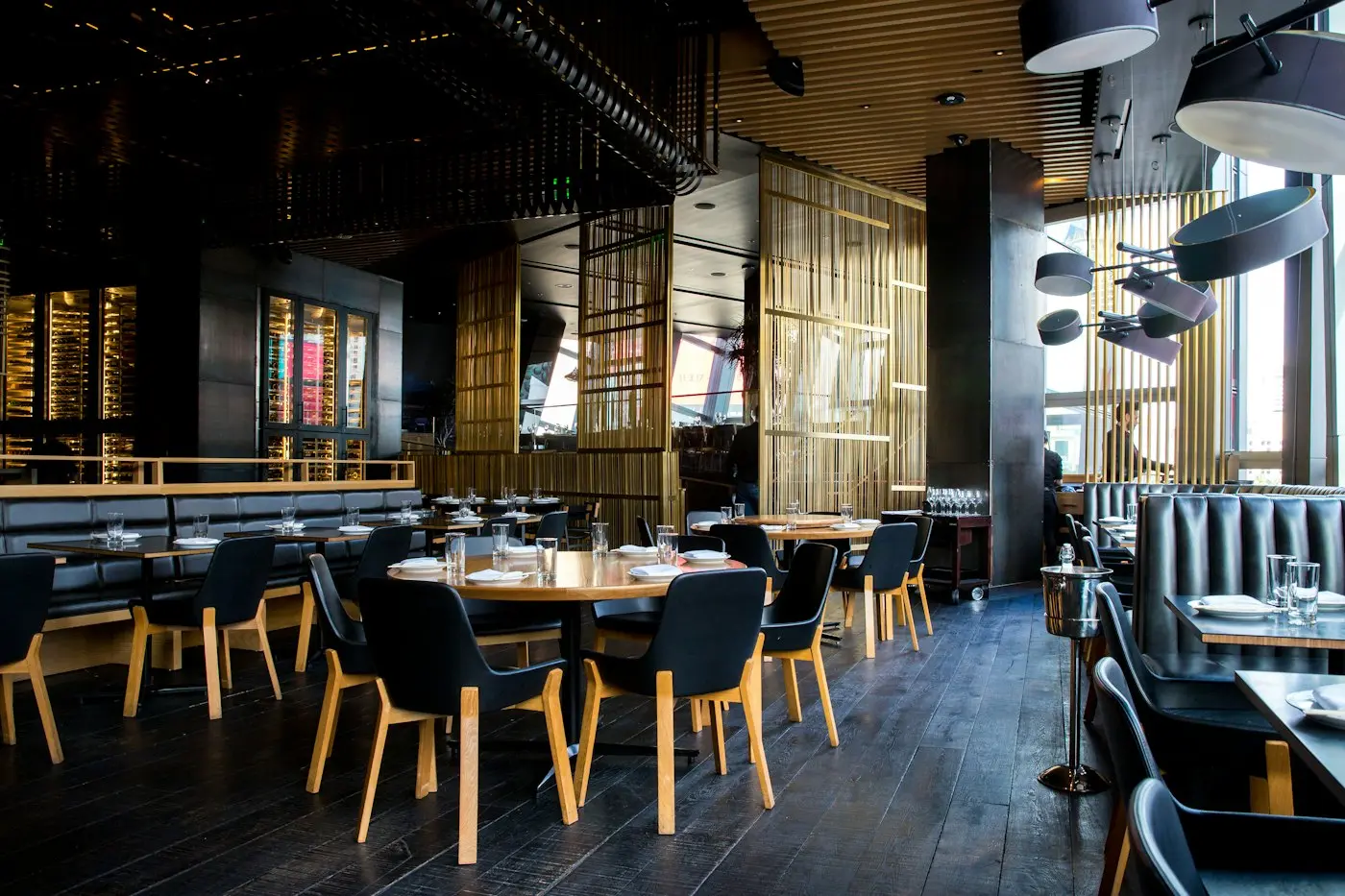 Dining room at night with warm pendant lights
