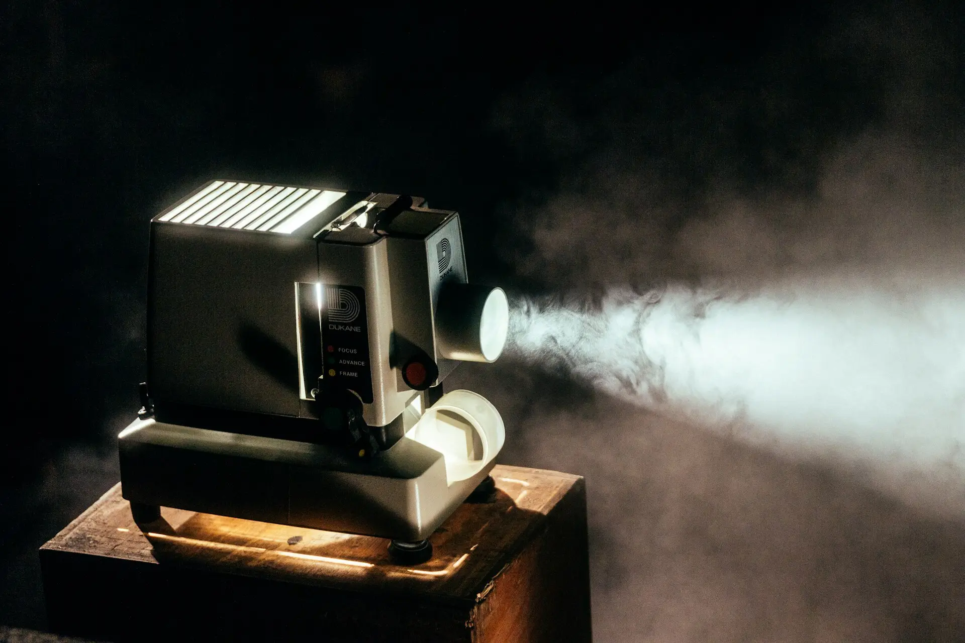 Vintage film projector beaming light